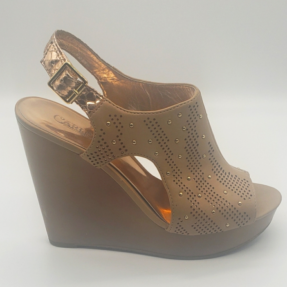 Beige colored wedge heel size 8.5 sandals with gold accents by Carlos Santana